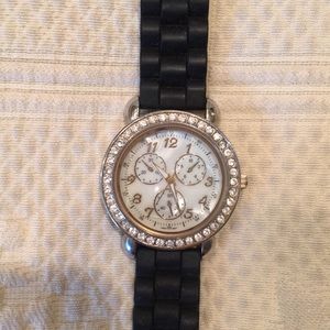 Black rubber banded crystal watch